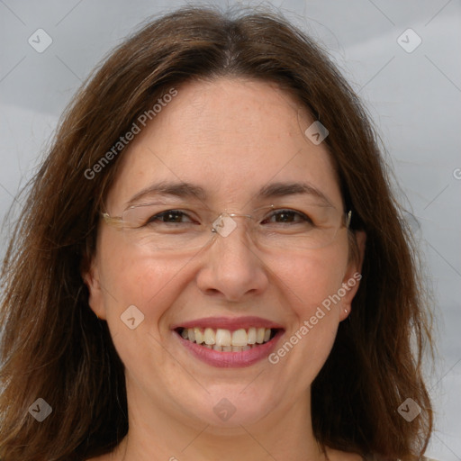 Joyful white adult female with medium  brown hair and brown eyes