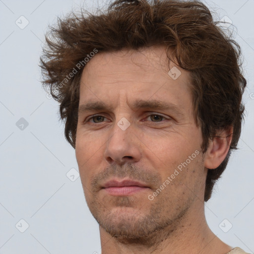 Neutral white adult male with short  brown hair and brown eyes