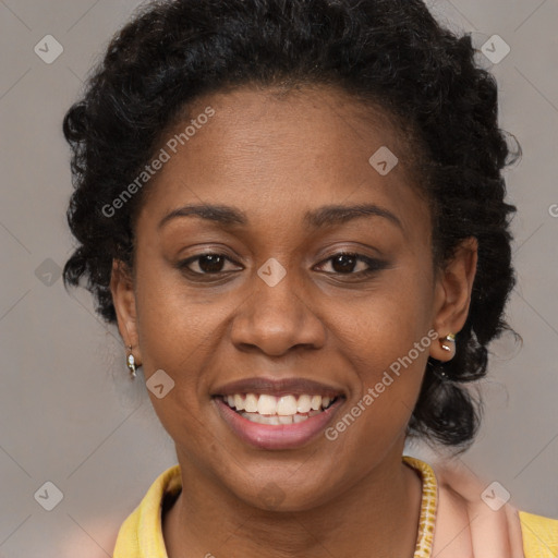 Joyful black young-adult female with medium  brown hair and brown eyes