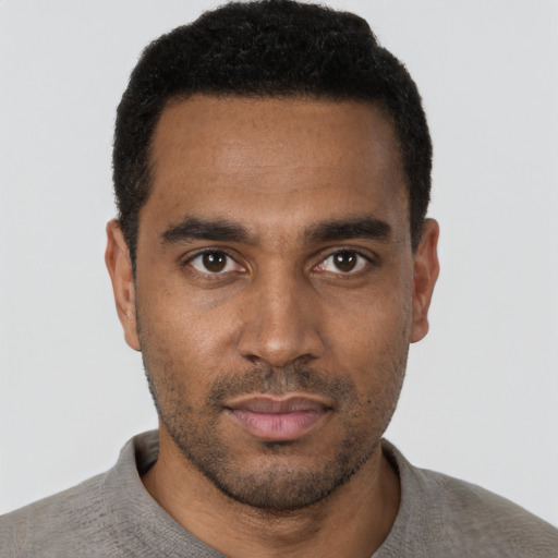 Neutral black young-adult male with short  black hair and brown eyes