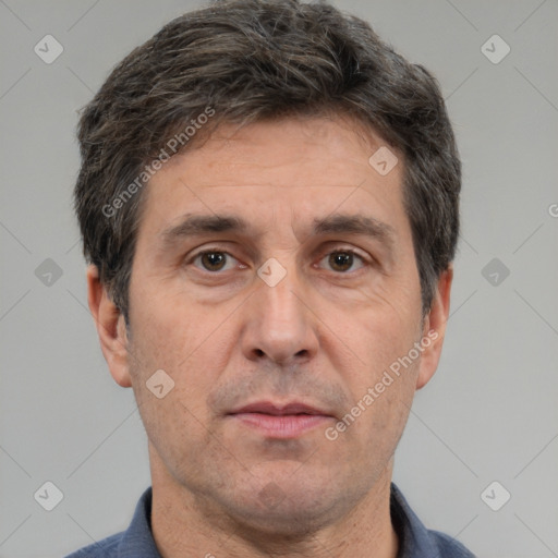 Neutral white adult male with short  brown hair and brown eyes