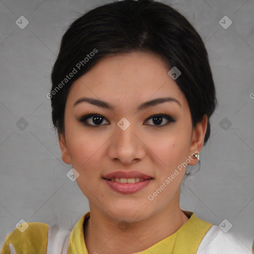 Joyful asian young-adult female with short  black hair and brown eyes