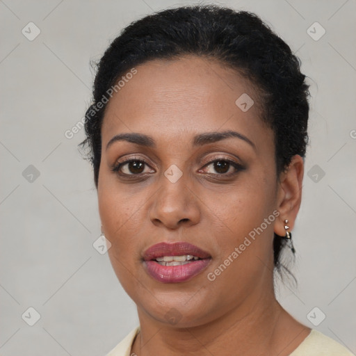 Joyful latino young-adult female with short  brown hair and brown eyes