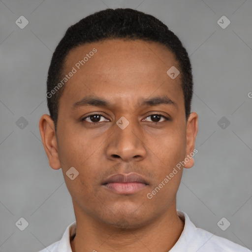 Neutral latino young-adult male with short  black hair and brown eyes