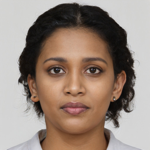 Neutral latino young-adult female with medium  black hair and brown eyes