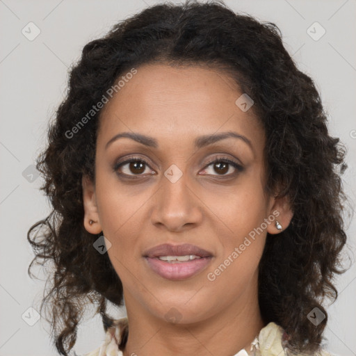 Joyful black young-adult female with medium  brown hair and brown eyes