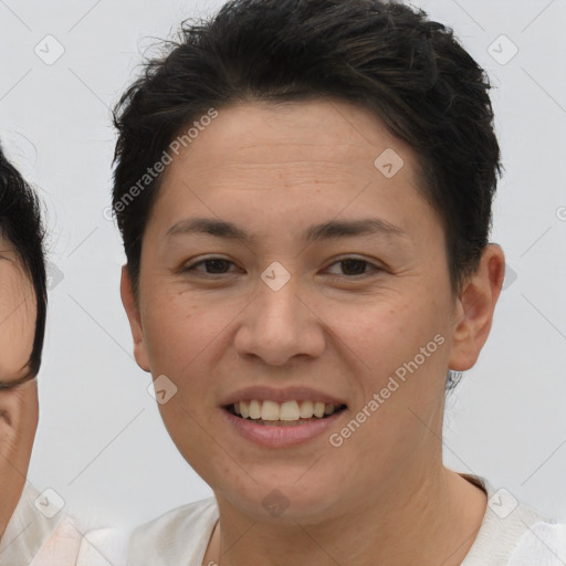 Joyful white adult female with short  brown hair and brown eyes