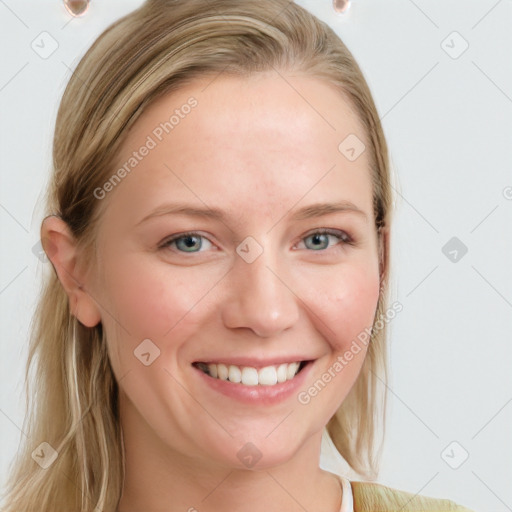 Joyful white young-adult female with long  brown hair and blue eyes