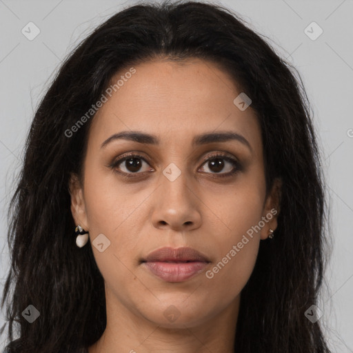 Joyful latino young-adult female with long  brown hair and brown eyes