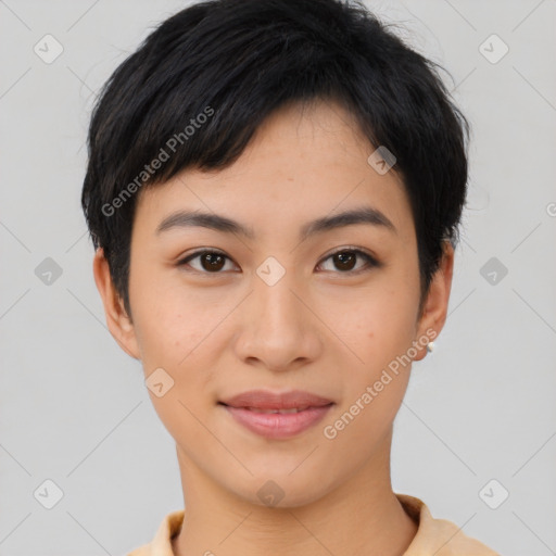 Joyful asian young-adult female with short  black hair and brown eyes