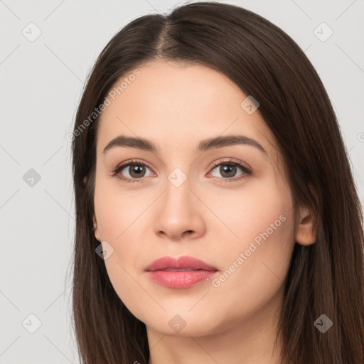 Neutral white young-adult female with long  brown hair and brown eyes