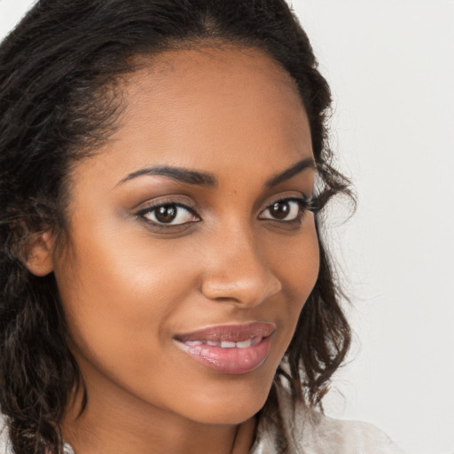 Joyful latino young-adult female with long  brown hair and brown eyes