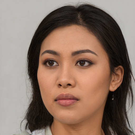 Neutral asian young-adult female with long  brown hair and brown eyes