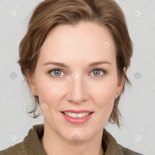 Joyful white young-adult female with medium  brown hair and blue eyes