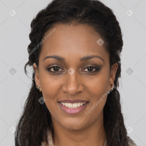Joyful black young-adult female with long  brown hair and brown eyes