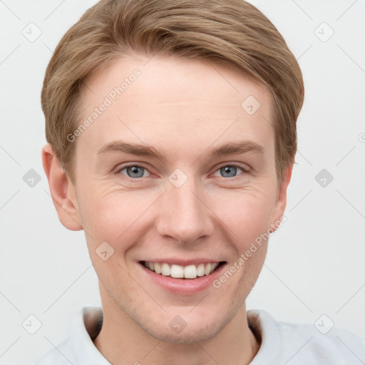 Joyful white young-adult female with short  brown hair and grey eyes