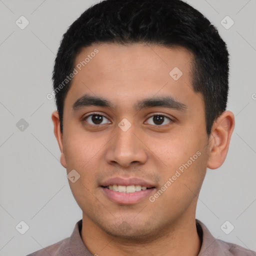 Joyful latino young-adult male with short  black hair and brown eyes