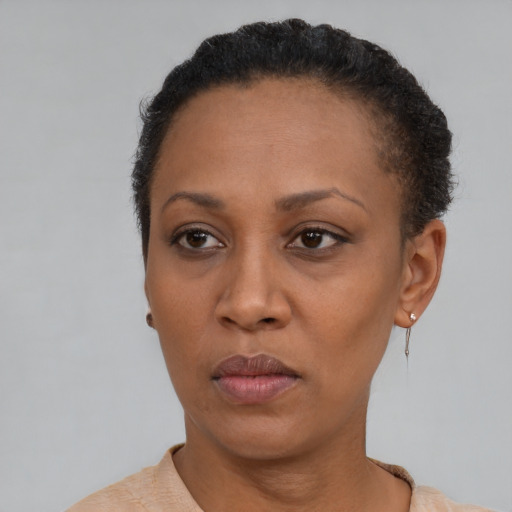Neutral black adult female with short  black hair and brown eyes