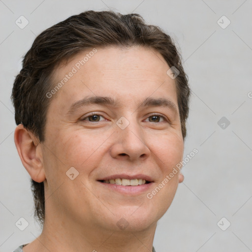 Joyful white adult male with short  brown hair and grey eyes