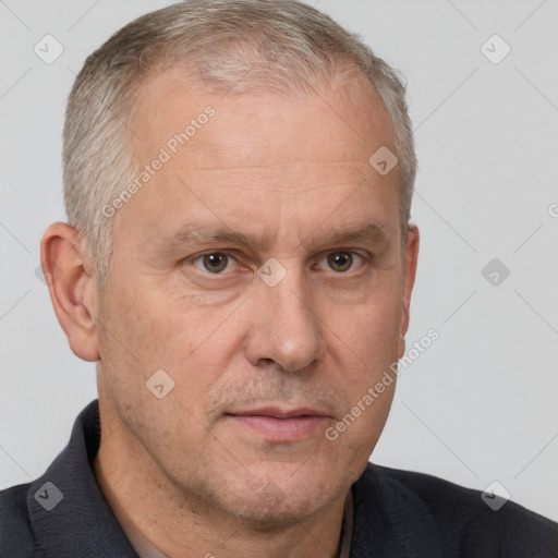 Neutral white middle-aged male with short  brown hair and brown eyes