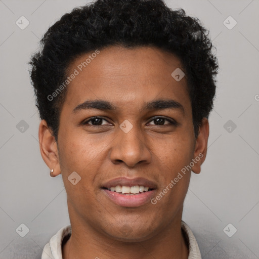 Joyful black young-adult male with short  brown hair and brown eyes