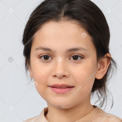 Joyful white child female with medium  brown hair and brown eyes