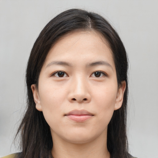 Neutral asian young-adult female with medium  brown hair and brown eyes