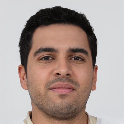 Neutral latino young-adult male with short  brown hair and brown eyes