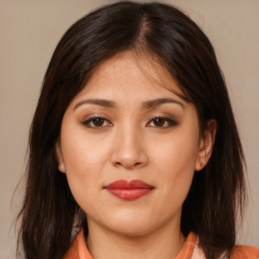 Joyful white young-adult female with medium  brown hair and brown eyes