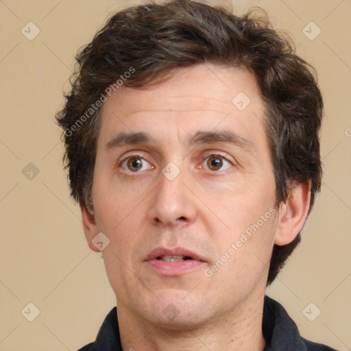 Neutral white adult male with short  brown hair and brown eyes