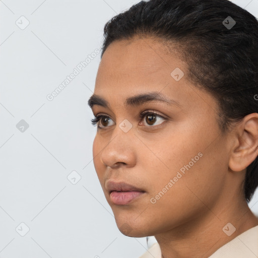 Neutral latino young-adult female with short  brown hair and brown eyes