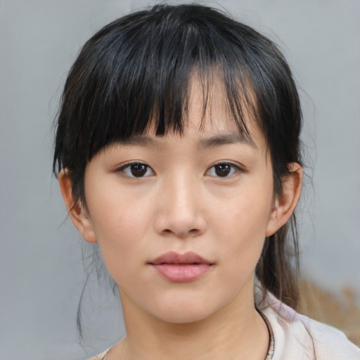Neutral asian young-adult female with medium  brown hair and brown eyes