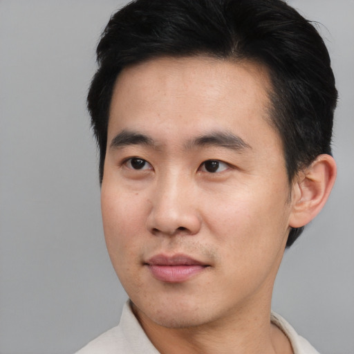 Neutral asian young-adult male with short  black hair and brown eyes
