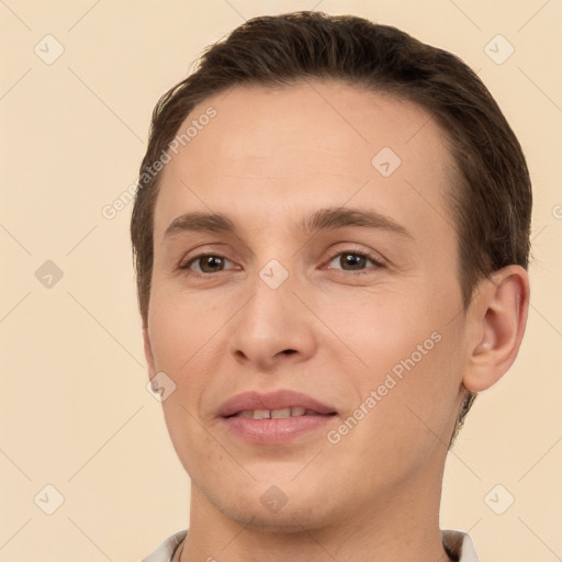 Joyful white young-adult male with short  brown hair and brown eyes