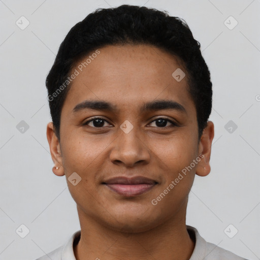 Joyful latino young-adult male with short  black hair and brown eyes