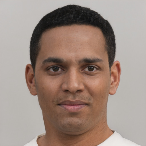 Neutral black young-adult male with short  black hair and brown eyes