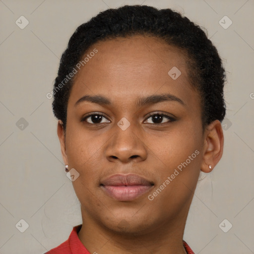 Joyful black young-adult female with short  brown hair and brown eyes