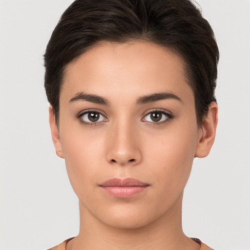 Neutral white young-adult female with short  brown hair and brown eyes