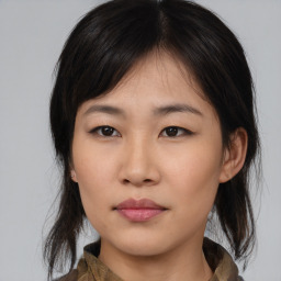 Neutral asian young-adult female with medium  brown hair and brown eyes