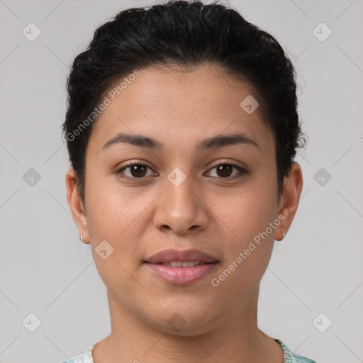 Joyful latino young-adult female with short  brown hair and brown eyes