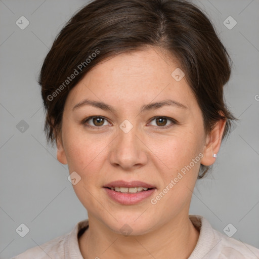 Joyful white adult female with medium  brown hair and brown eyes