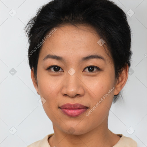 Joyful latino young-adult female with short  brown hair and brown eyes