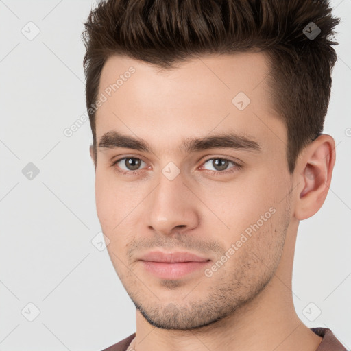 Neutral white young-adult male with short  brown hair and brown eyes