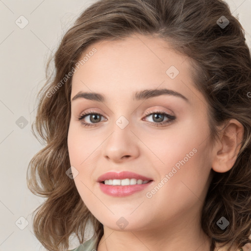 Joyful white young-adult female with long  brown hair and green eyes