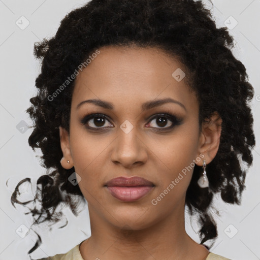 Joyful black young-adult female with medium  black hair and brown eyes