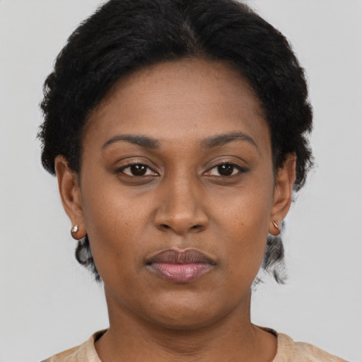 Neutral black young-adult female with short  brown hair and brown eyes