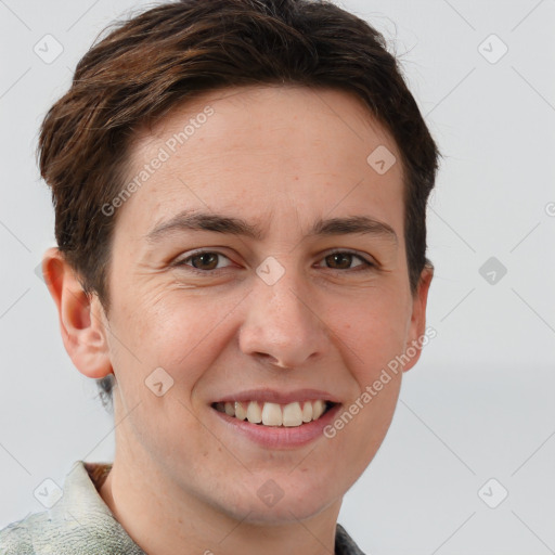 Joyful white young-adult female with short  brown hair and grey eyes