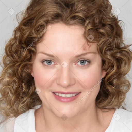 Joyful white young-adult female with medium  brown hair and blue eyes