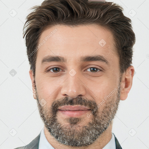 Joyful white adult male with short  brown hair and brown eyes