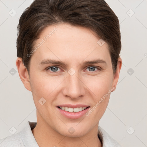 Joyful white young-adult female with short  brown hair and grey eyes